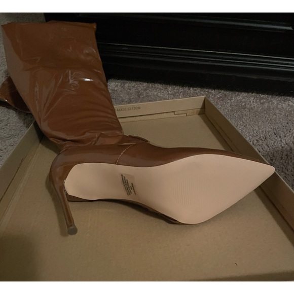 I am selling a pair of Steve Madden, brown over the knee boots, size 8. - Picture 4 of 4